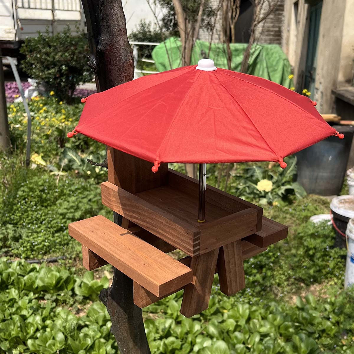 # Solid Wood Small Animal Feeding Table with Red Umbrella
