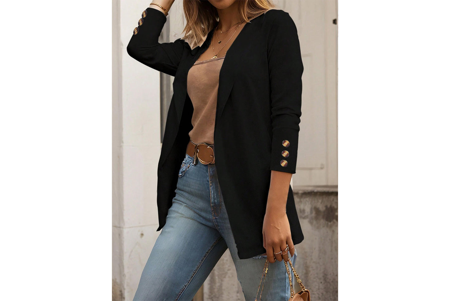 **Slim-fitting, stylish long-sleeved, button-embellished jacket**